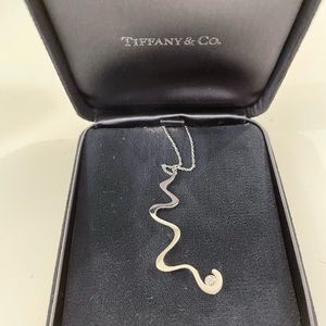 Authentic Tiffany and Co. Silver necklace with diamond.